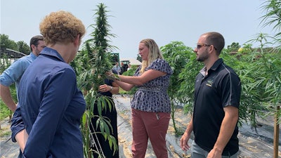 Rep. Chrissy Houlahan (left) visits a hemp farm this summer in Pennsylvania.