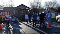 Ohio voters in Cuyahoga County (Cleveland) walk past campaigners and toward their polling location with an adult-use cannabis legalization measure on the ballot for the Nov. 7, 2023, election.
