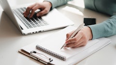 Working On Laptop With Notepad Adobe Stock Paegag Resized