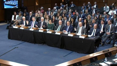 Charles W. Scharf (from left), CEO and president of Wells Fargo & Company; Brian Thomas Moynihan, chairman and CEO of Bank of America; Jamie Dimon, chairman and CEO of JPMorgan Chase & Co.; Jane Fraser, CEO of Citigroup; Ronald O’Hanley, CEO of State Street; Robin Vince, CEO of BNY Mellon; David Solomon, CEO of Goldman Sachs; and James P. Gorman, CEO of Morgan Stanley.