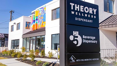 Theory Wellness built out its Hi5 Beverage Dispensary in a former Volkswagen dealership in Medford, Mass., 5 miles northwest of Boston.