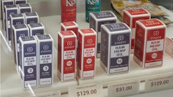 Raw hemp oil / CBD products on a shelf in a retail store. Photo taken in Vista, Calif. - Nov. 25, 2019.