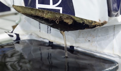 Measuring runoff water.