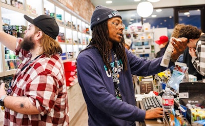 Cannabis retail workers serve customers at one of Perfect Union's eight dispensary locations in Northern California.