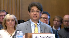 Aaron Klein, a senior fellow in economic studies at the Brookings Institution, testifies as a witness during the U.S. Senate Banking Committee's hearing on debanking on Feb. 5.