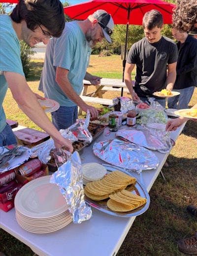 VT Dry & Cure team members at a summer company lunch.