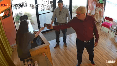 Texas Lt. Gov. Dan Patrick shows his ID at Austin-based hemp retailer Happy Cactus.