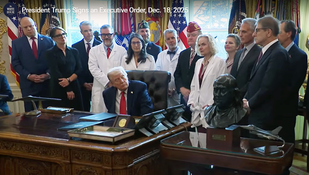 President Donald Trump signs an executive order Dec. 18, 2025, to reclassify cannabis to Schedule III.