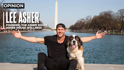 Lee Asher with his Saint Bernard, Lillie, whose seizures stopped after being treated with CBD.