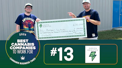 Green Rebates Creative Producer Ethan Cohen (right) visits Michigan's Amber Waves Cannabis Co.'s facility to deliver a rebate for nearly $600,000.