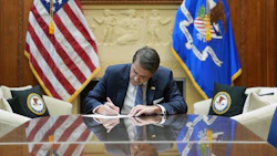 U.S. Acting Attorney General Todd Blanche signs an order to reschedule cannabis on April 23, 2026.