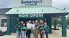 Pictured at the ribbon-cutting ceremony for Sweetspot Hamilton are (from left to right): Fred Dumont, Director of Community and Economic Development for Hamilton; Tom Lew, Vice President of Marketing at Sweetspot; Ben Herbs, Chief Business Development Officer at Sweetspot; Harry Patel, Sweetspot Hamilton owner; and Hamilton Mayor Jeff Martin. They are joined by members of the Sweetspot staff.