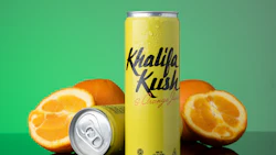 Khalifa Kush orange-flavored beverage can with fresh oranges on green background