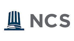 NCS logo featuring a stylized dark teal building icon with gray sans-serif text