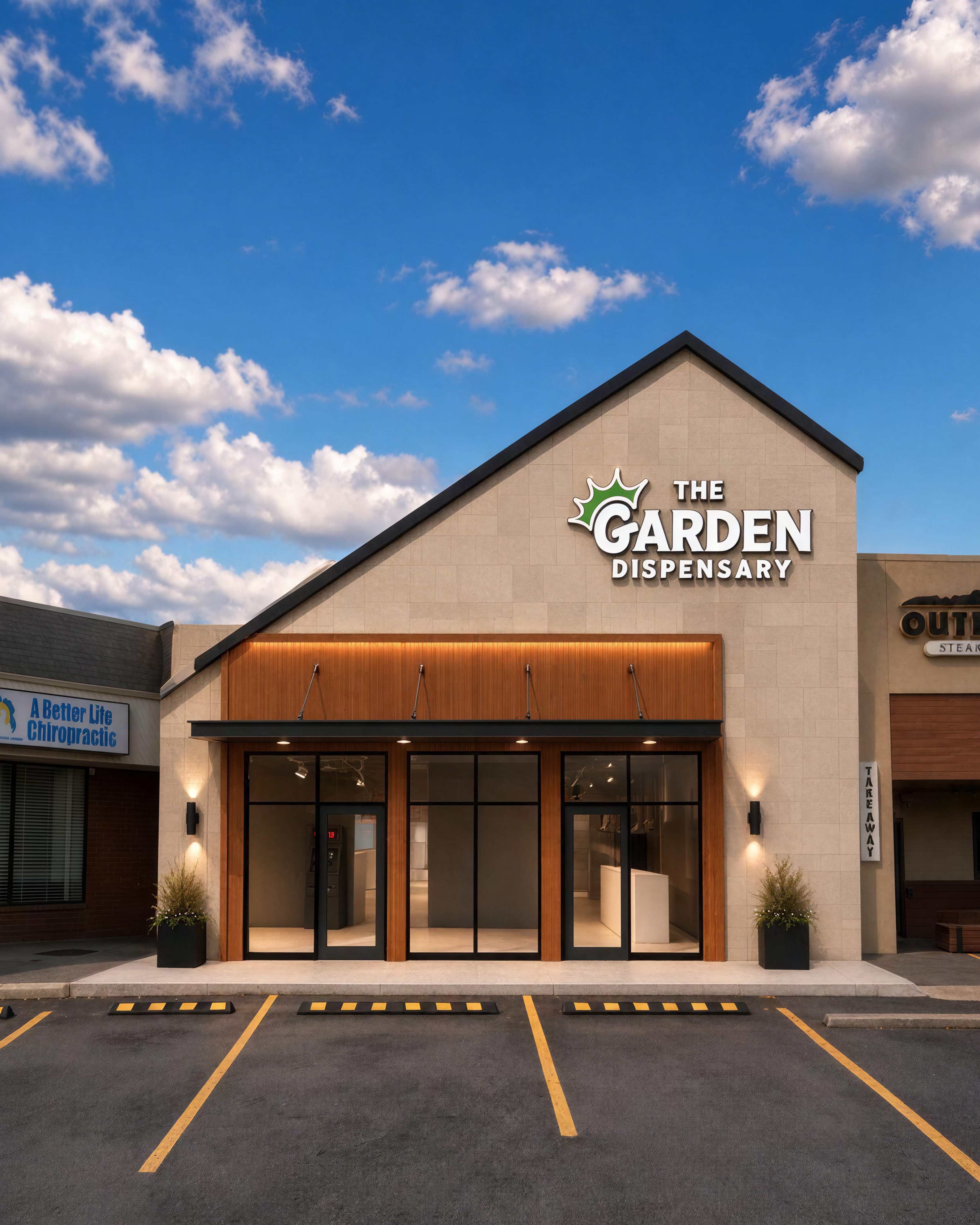 The Garden Dispensary storefront with modern tan facade, wooden accent awning, and glass doors in a retail plaza
