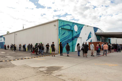 The line wraps around the building outside Perfect Union Northside during the 420 event.